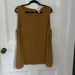 A MTL 1980 brand Sleeveless tunic style blouse. Size 3x. Like new.